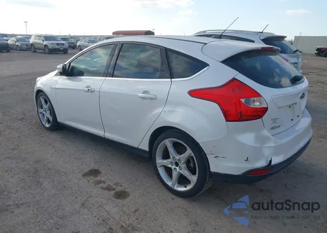 2013 Ford Focus Titanium z USA, uszkodzony, nr VIN 1FADP3N21DL280692